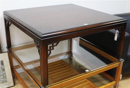 A mahogany square coffee table